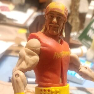 Red and Yellow Action Figure Hulk Hogan